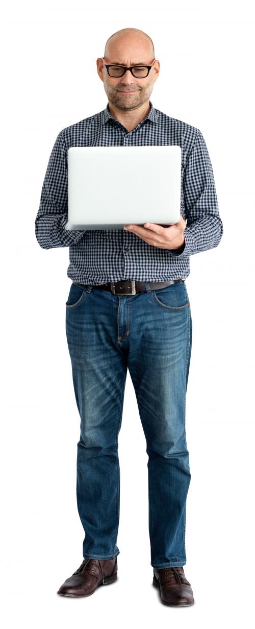 Casual man standing using a laptop - 4709