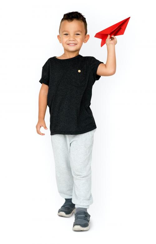 Little Boy Holding Paper Plane Studio Portrait - 4878