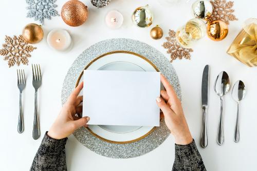 Blank card on a holiday table setting - 5614