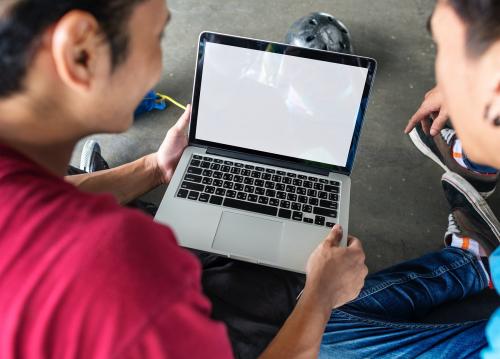 Young boys holding a computer mockup - 5663