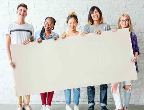 Diverse teens holding a big placard - 5718