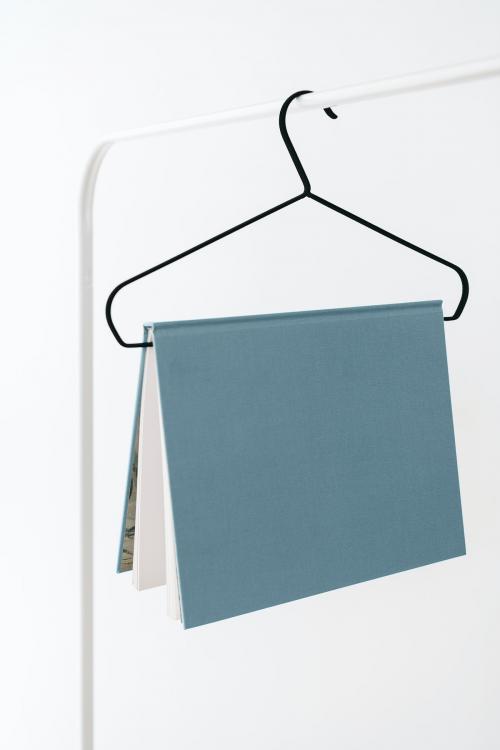 Book mockup hanging on a hanger - 1215219