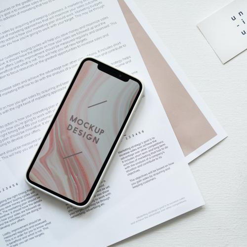 Smartphone mockup design on table workplace - 1220886