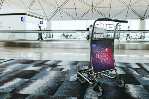 Airport luggage trolley in a passenger terminal - 1221395