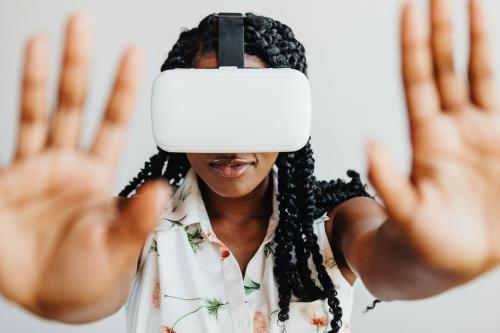 Black woman enjoying a VR headset mockup - 1226510