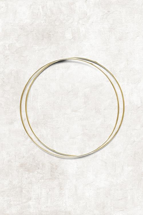 Round gold frame on beige marble background - 1204285