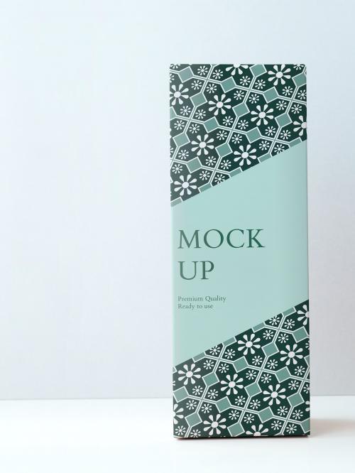 Green Asian patterned wrap paper on a box mockup - 1212256