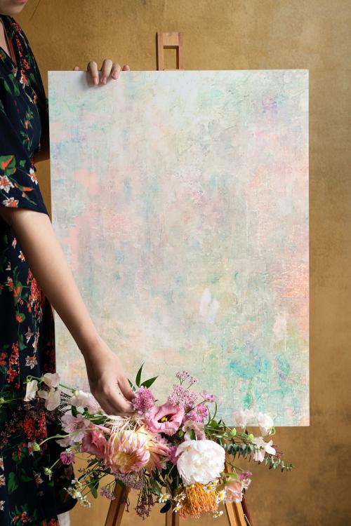 Painted canvas mockup with a bouquet of flowers - 1212463