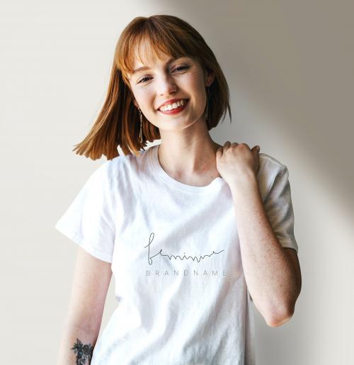 Smiling woman wearing a silk screenwhite t-shirt mockup - 1198655