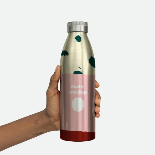 Hand holding a stainless steel bottle mockup - 2277086