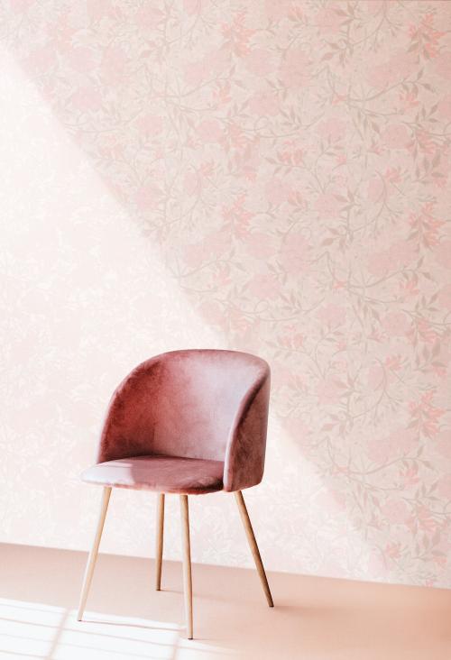 Pink chair by a wall mockup - 1235580