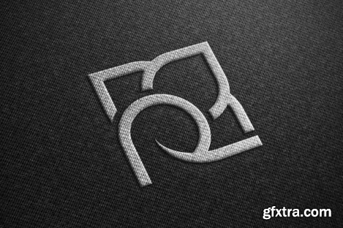 Realistic mockup of logo on black fabric