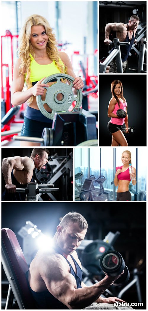 Men and women in gym stock photo