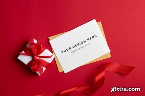 Greeting card mockup with gift boxes on red background