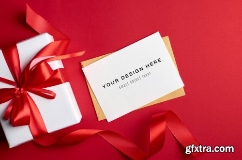 Greeting card mockup with gift boxes on red background