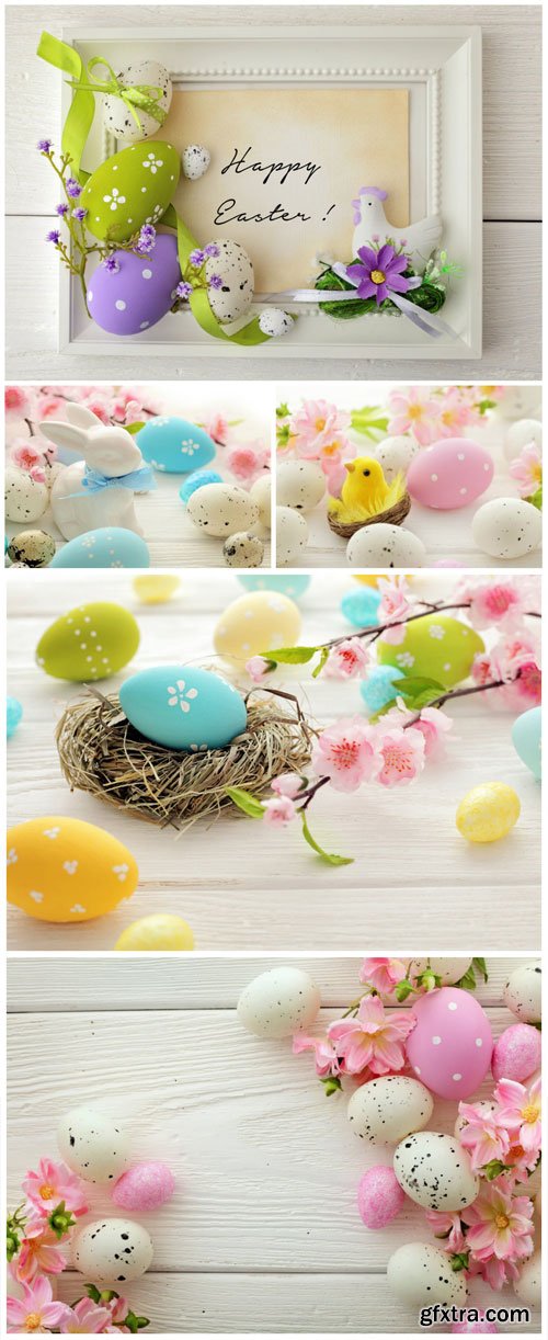 Easter eggs and flowers stock photo