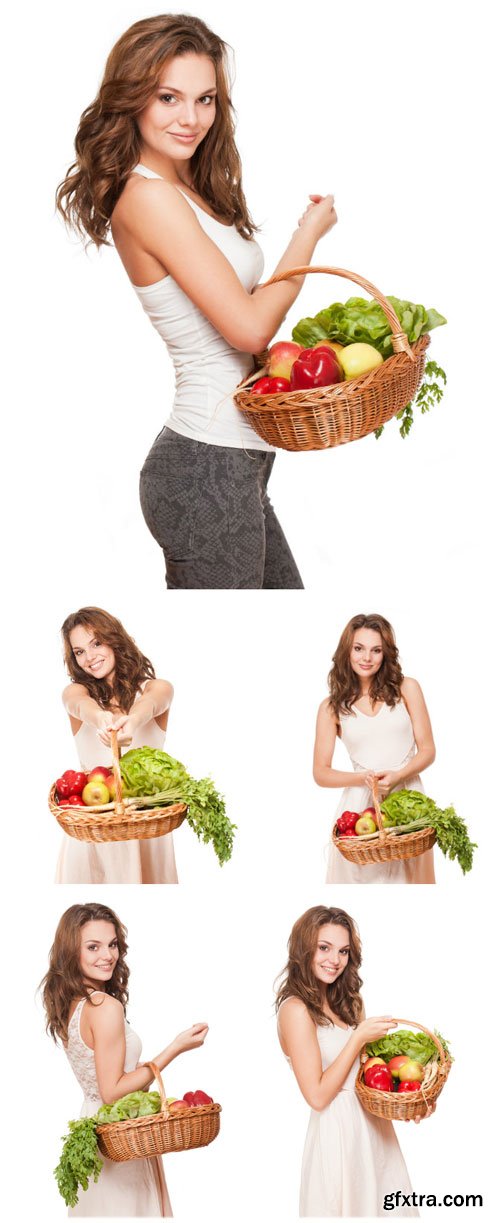 Girl holding a basket of vegetables stock photo