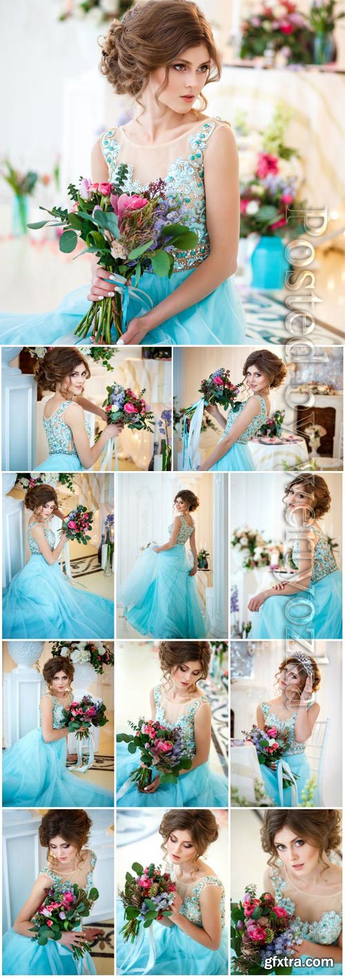 Girl in blue evening dress with flowers stock photo