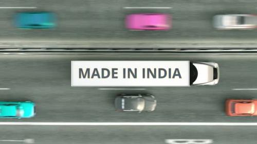 Videohive - Trailer Trucks with MADE IN INDIA Text Driving Along the Road - 32332362 - 32332362