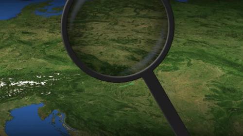 Videohive - Magnifying Glass Finds Vienna City on the Map - 32332440 - 32332440