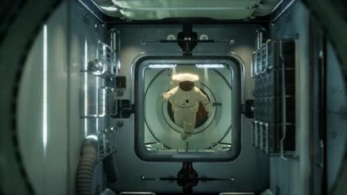 Videohive - Astronaut Inside the Orbital Space Station - 32355570 - 32355570
