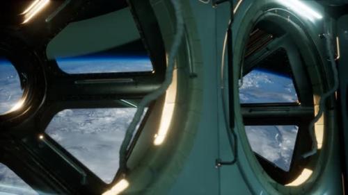 Videohive - Cockpit View From International Space Station Operating Nearby of Planet Earth - 32355576 - 32355576