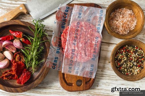 Hamburger raw meat wrapping paper olives jar Food on the table mockup