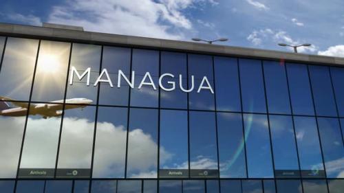 Videohive - Airplane landing at Managua Nicaragua airport mirrored in terminal - 32426842 - 32426842