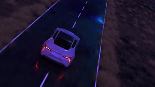 Videohive - The Car Rushes at Fast Speed Along the Asphalt Road Along the Desert Into a Fabulous Sunset with a - 32441919 - 32441919