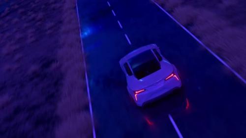 Videohive - The Car Rushes at Fast Speed Along the Asphalt Road Along the Desert Into a Fabulous Sunset with a - 32441942 - 32441942