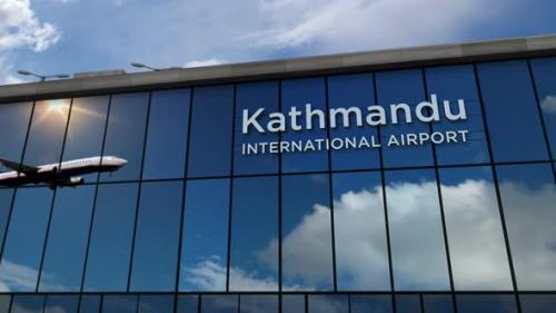 Videohive - Airplane landing at Kathmandu Nepal airport mirrored in terminal - 32618718 - 32618718