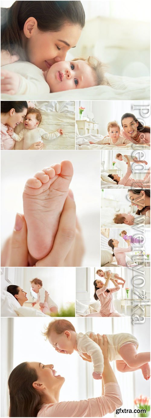 Happy mom with baby stock photo