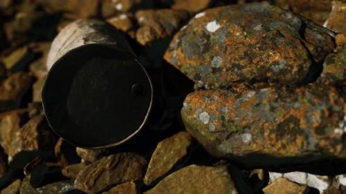 Videohive - Rusty Destroyed Metal Barrel on Beach Rocks - 32700727 - 32700727