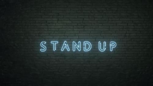 Videohive - Glowing Stand Up Emblem on Black Brick Wall Background - 32678975 - 32678975