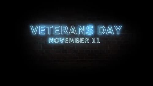 Videohive - Veterans day. Text neon light on brick wall background. - 32821308 - 32821308