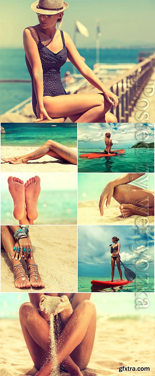 Girl on the sand by the sea stock photo