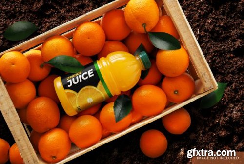 Orange juice bottle over oranges box