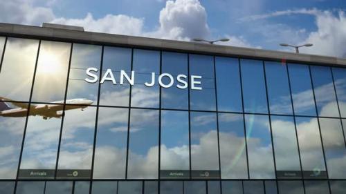 Videohive - Airplane landing at San Jose California, Costa Rica airport mirrored in terminal - 33018465 - 33018465