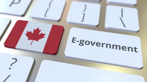 Videohive - Electronic Government Text and Flag of Canada on the Keys - 33023916 - 33023916