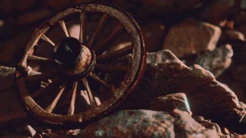 Videohive - Old Wooden Wheel on Rocks - 32989211 - 32989211