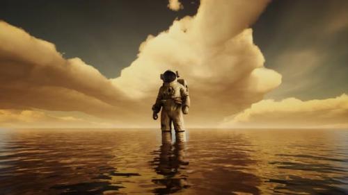 Videohive - Spaceman in the Sea Under Clouds at Sunset - 32990706 - 32990706