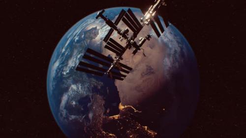 Videohive - International Space Station in Outer Space Over the Planet Earth Orbit - 33100180 - 33100180