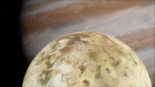 Videohive - Closeup of Io Moon with a Gigantic Perspective of Jupiter Transit - 33057112 - 33057112