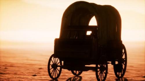 Videohive - Canvas Covered Retro Wagon in Desert at Sunset - 33152843 - 33152843