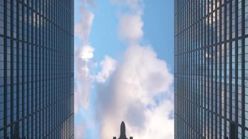 Videohive - Airplane flies to the tops of the skyscrapers. Look up view at skyscrapers and flying plane - 33166943 - 33166943