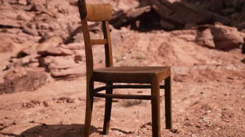 Videohive - Old Wooden Chair on Rocks of Grand Canyon - 33330764 - 33330764