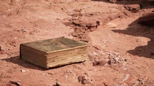 Videohive - Old Book in Red Rock Desert - 33330856 - 33330856