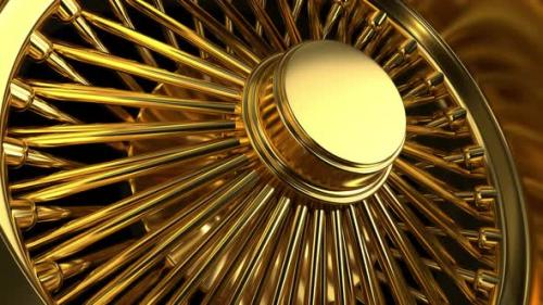 Videohive - Looping Close Up View Triple Gold Wire Wheel With Tire - 33387515 - 33387515