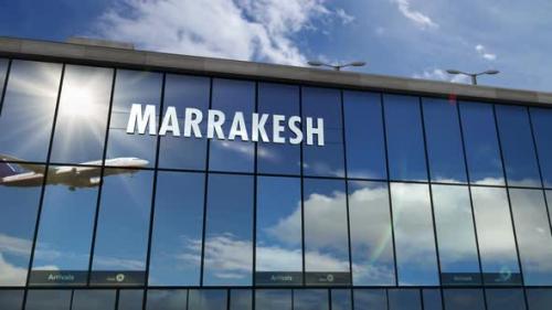 Videohive - Airplane landing at Marrakesh, Marrakech Morocco airport mirrored in terminal - 33409181 - 33409181