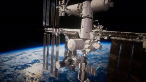 Videohive - International Space Station in Outer Space Over the Planet Earth - 33521444 - 33521444